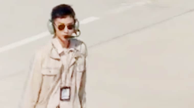 goodlooking airport worker gets 10 percent salary cut, salary cut for hot airport worker, airport worker wins hearts on social media, good looking airport worker, airport staff gets salary cut, 