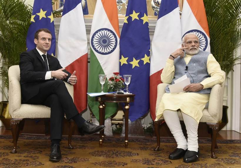 Macron in India, French President, Macron in India photos, French President images, Macron ceremonial reception, Macron Modi photos, Narendra Modi, India France ties, Indian Express