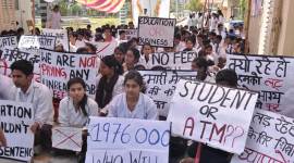 Medical students from Shri Guru Ram Rai Institute of Medical and Health Sciences, a private medical college in Dehradun, protest against the 300 percent fee hike. (Express photo/Virender Singh Negi)