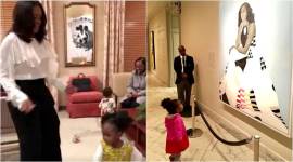 Michelle Obama, Michelle Obama portrait, the little girl dancing with Michelle Obama, Michelle Obama dancing with a little girl