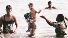 People at Girgaum Chowpatty beach on Sunday. (Vignesh Krishnamoorthy)