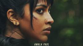 poster of Amala Paul next Adho Andha Paravai Pola