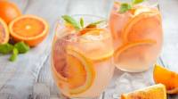 Cold refreshing drink with blood orange slices in a glass on a wooden background. summer, summer drinks, hydration in summer, summer health care, tips to keep hydrated, how to fight dehydration, Chronic fluid insufficiency, health news, indian express, lifestyle news