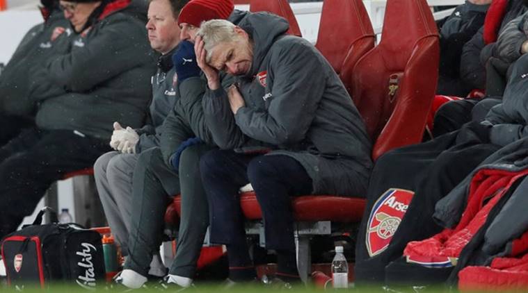 Arsenal manager Arsene Wenger looks dejected