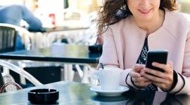 Midle aged woman using mobile phone online dating, education status, evolution, economic analysis, mating behaviour, Indian Express, Indian Express News