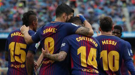 Soccer Football - La Liga Santander - FC Barcelona vs Valencia - Camp Nou, Barcelona, Spain - April 14, 2018   Barcelona's Luis Suarez celebrates scoring their first goal with Philippe Coutinho    REUTERS/Albert Gea