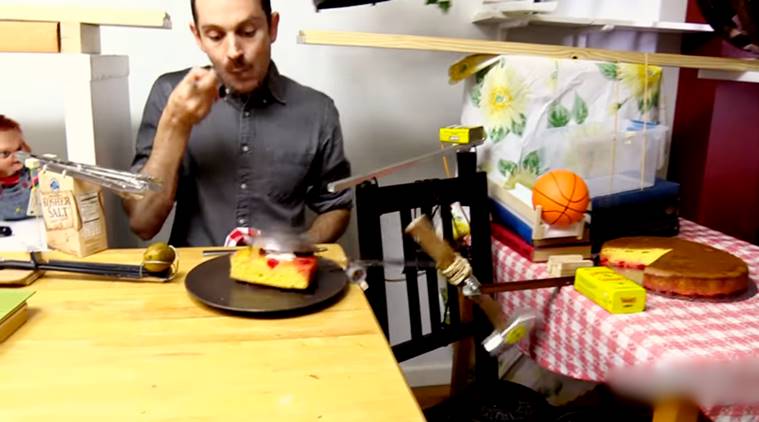 Joseph's Machines videos, cake serving machine, funny cake serving machine, viral video of cake serving machine, DIY cake serving machine, indian express, indian express news