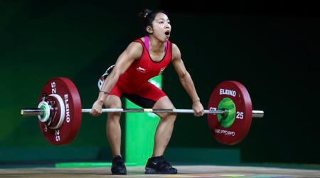India's Saikhom Mirabai Chanu lifts to set a new Commonwealth Games record in snatch in women's 48kg Weightlifting at the Commonwealth Games in Gold Coast, Australia, Thursday, April 5, 2018. (AP Photo/Manish Swarup)