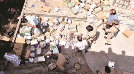 Police claim Bhati started firing from the terrace. Express