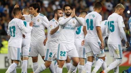 Real Madrid player Isco gestures after scoring against Malaga