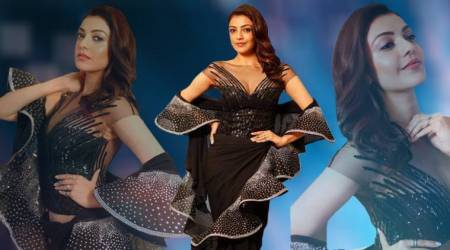 Kajal Aggarwal, Kajal Aggarwal latest photos, Kajal Aggarwal Zee Apsara Awards, Kajal Aggarwal fashion, Kajal Aggarwal Abu Jani Sandeep Khosla, Kajal Aggarwal sari, Kajal Aggarwal black ruffle sari, indian express, indian express news