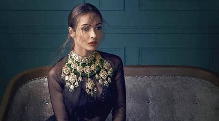 Malaika Arora shows us how to add some sultriness to our power outfits |  Fashion News - The Indian Express