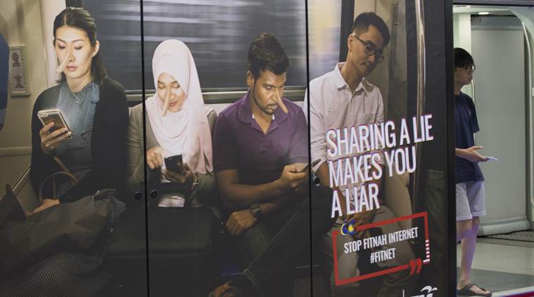Malaysia approves law banning fake news ahead of elections