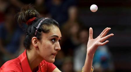 Gold Coast:  India's Manika Batra serves Malaysian pair of Chee Feng Leong and Ying Ho during their mixed doubles Table Tennis round 32 match at the Commonwealth Games 2018 in Gold Coast, Australia on Wednesday. PTI Photo by Manvender Vashist   (PTI4_11_2018_000082A)