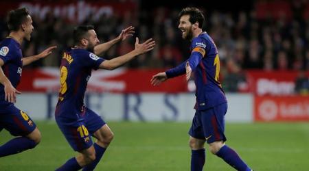 Soccer Football - La Liga Santander - Sevilla vs Barcelona - Ramon Sanchez Pizjuan, Seville, Spain - March 31, 2018   Barcelona's Lionel Messi celebrates scoring their second goal with Jordi Alba   REUTERS/Jon Nazca