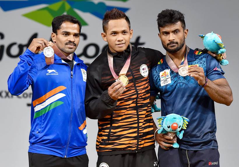 P Gururaja with other medallists at the podium.