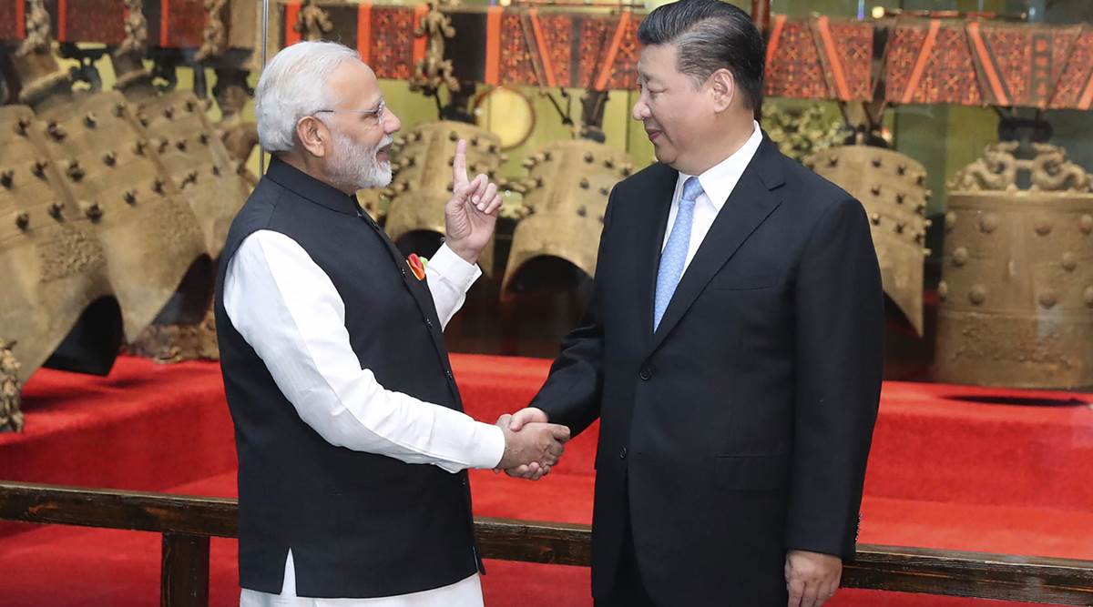How Donald Trump cast his shadow on the Modi-Xi meet in Wuhan