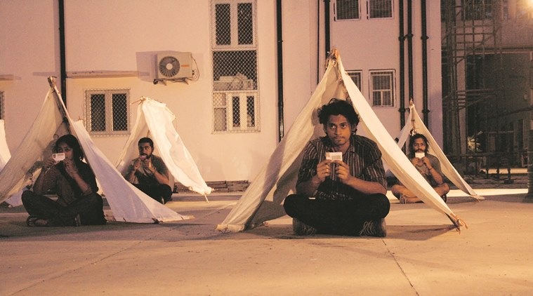The performance begins with a speeding factory van coming to a sudden stop and two people jumping out of the back. (Vishala Ramachandra Mahale)