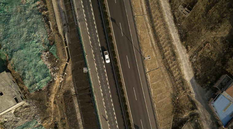 China smart road, electric cars, autonomous technology, Qilu Transportation, car charging systems, transportation business, global EV sales, road infrastructure