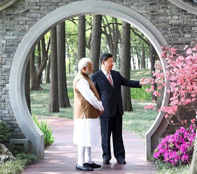 pm modi in china, modi jinping boat ride, modi at east lake, modi jinping pictures, modi jinping meeting, india china summit, india china relations