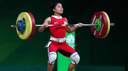 India's Sanjita Chanu lifts to win Gold medal in women's 53Kg Weightlifting final during the Commonwealth Games, in Gold Coast, Australia, Friday, April 6, 2018. (AP Photo/Manish Swarup)
