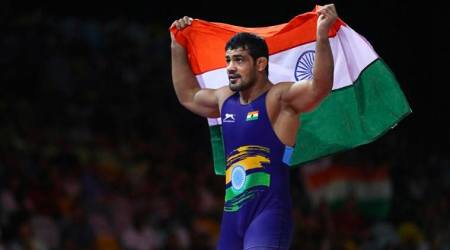 India's Sushil Kumar celebrates soon after wining in men's FS 74Kg wrestling against South Africa's Johannes Botha at the Commonwealth Games on Gold Coast, Australia, Thursday, April 12, 2018. (AP Photo/Manish Swarup)