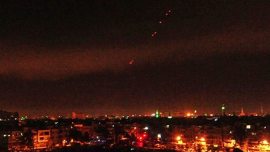 This photo released by the Syrian official news agency SANA, shows anti-aircraft fire in the sky after US-led airstrikes targeting different parts of the Syrian capital Damascus in retaliation for the country's alleged use of chemical weapons. (AP)