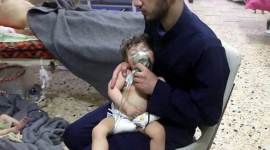This image made from video released by the Syrian Civil Defense White Helmets, which has been authenticated based on its contents and other AP reporting, shows a medical worker giving toddlers oxygen through respirators following an alleged poison gas attack in the opposition-held town of Douma. (AP)