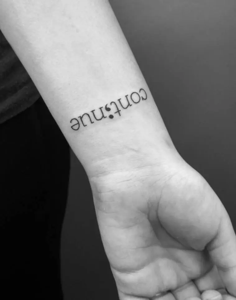 Tiny Semicolon on the Wrist Tattoo by Seyoon