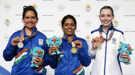 Tejaswini Sawant and Anjum Moudgil on the podium at Commonwealth Games