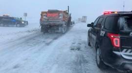 Storm blasts central US with snow, ice and wind, killing 3