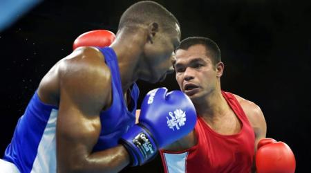 Gold Coast: India's Vikas Krishan Yadav and Zambia's Benny Muziyo compete in the Men's 75kg category quarterfinals boxing bout at the Commonwealth Games 2018 at Oxenford Studios in Gold Coast, on Wednesday.  PTI Photo by Manvender Vashist (PTI4_11_2018_000137A)