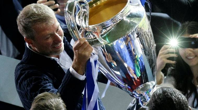 Chelsea owner Roman Abramovich raises the UEFA Champions League trophy after the final against Bayern Munich at the Allianz Arena in Munich, 19 May 2012.