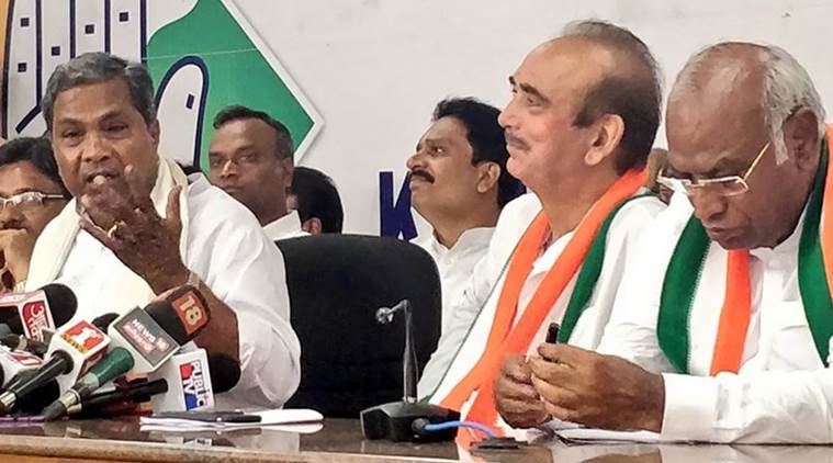 Former Karnataka chief minister Siddaramaiah and senior Congress leader Ghulam Nabi Azad at the press meet on Friday. (@INCIndia)