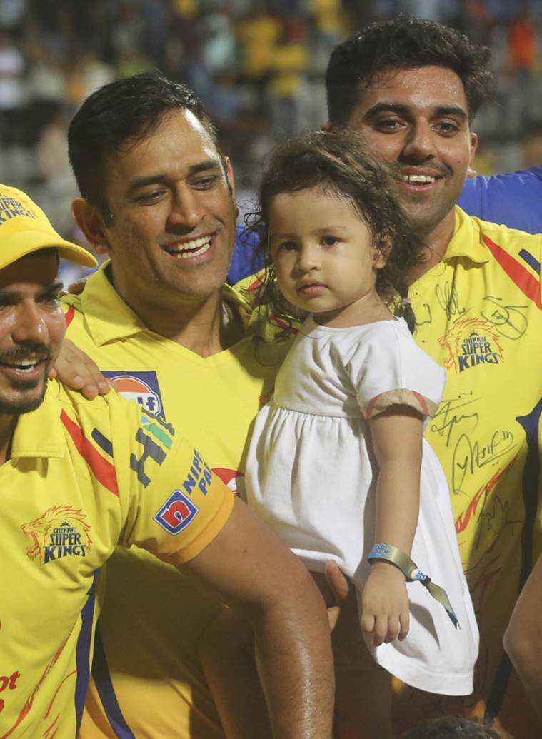 Chennai Super Kings Mahinder Singh Dhoni along with his daughter Ziva celebrates after winning against Sunrisers Hyderabad's at VIVO IPL cricket T20 final match in Mumbai, India