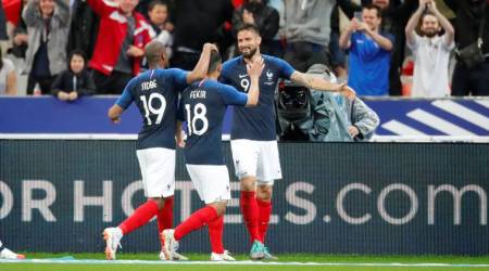 France’s Olivier Giroud celebrates scoring their first goal against Republic of Ireland in Paris