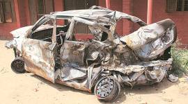 Day after 2 charred to death in cab, police arrest driver of truck that crashed into it