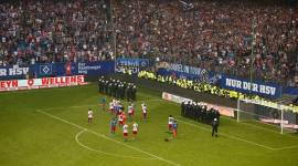Hamburg players applaud the fans at the end of the match