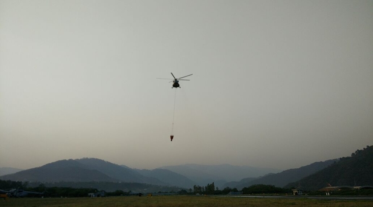 IAF choppers use bambi buckets to control forest fire in Trikuta hills, Vaishno Devi Yatra resumes