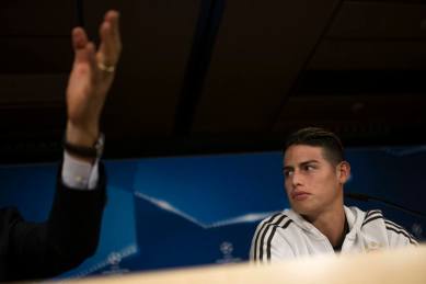 Bayern Munich's James Rodriguez talks to journalists during a news conference at the Santiago Bernabeu stadium in Madrid