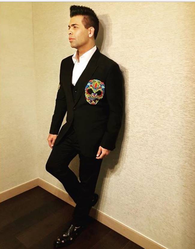 Karan Johar, Karan Johar birthday, Karan Johar fashion, Karan Johar quirky fashion, Karan Johar latest outfits, Karan Johar airport looks, Karan Johar men fashion, Karan Johar suits, indian express, indian express news