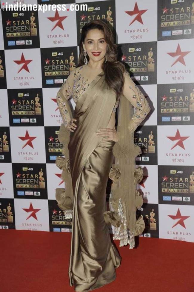 Madhuri Dixit, Madhuri Dixit birthday looks, Madhuri Dixit latest photos, Madhuri Dixit fashion, Madhuri Dixit smile, Madhuri Dixit saris, Madhuri Dixit ethnic saris, indian express, indian express news