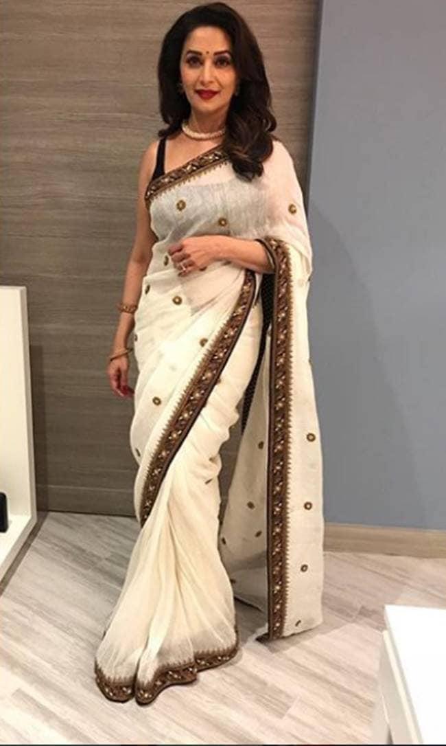 Madhuri Dixit, Madhuri Dixit birthday looks, Madhuri Dixit latest photos, Madhuri Dixit fashion, Madhuri Dixit smile, Madhuri Dixit saris, Madhuri Dixit ethnic saris, indian express, indian express news