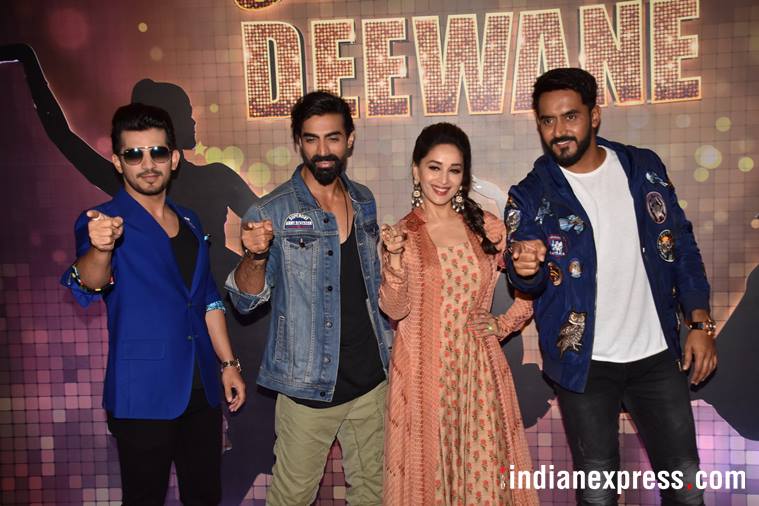 Madhuri Dixit makes hearts skip a beat in pink chiffon block