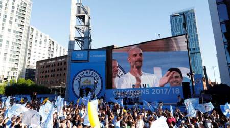 Soccer Football - Premier League - Manchester City Premier League Title Winners Parade - Manchester, Britain - May 14, 2018   Manchester City manager Pep Guardiola on stage during the parade   Action Images via Reuters/Andrew Boyers