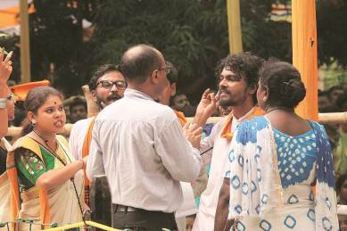 Visva-Bharati students argue with university officials over shortage of drinking water during the institute’s 49th convocation on Friday. (Subham Dutta)