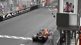 Red Bull driver Daniel Ricciardo of Australia crosses the finish line to win the Monaco Formula One race, at the Monaco racetrack, in Monaco