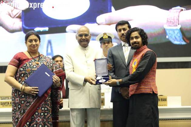 Bengali actor Riddhi Sen accepts his Best Actor (Male) award for his film Nagakirtan from President Ram Nath Kovind. (Express Photo: Tashi Tobgyal)
