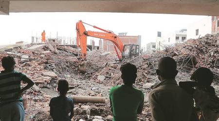 At the site of building collapse at at Peer Muchalla. (Express Archives)