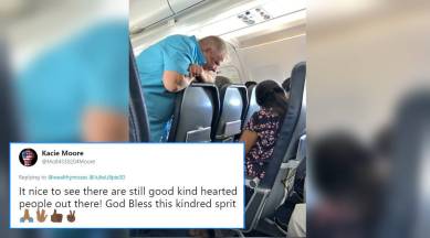 girl on plane helped, two year old kindness story, old man helps 2 year old, plane story warms heart, plane viral story warms heart, 2 year old cheered by old man, indian express, indian express news